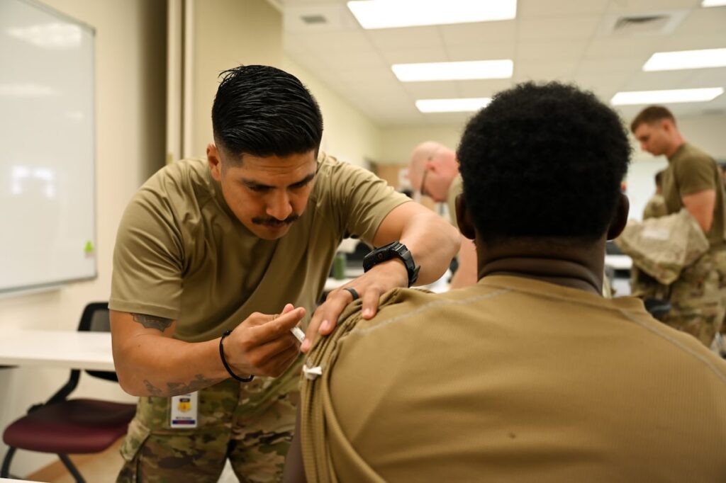 Following an outbreak, lawmakers push to require flu vaccine for all service members in budget bill provision Following an outbreak, lawmakers push to require flu vaccine for all service members in budget bill provision