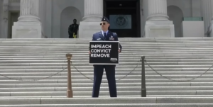 Air Force major restricted to DC base, under investigation after uniformed protest Air Force major restricted to DC base, under investigation after uniformed protest