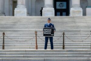 Active-duty Air Force officer who called for Trump impeachment faces three charges